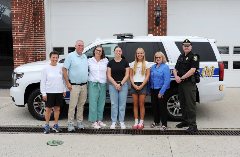 Gathered for the presentation of the Geoff and Ken Derrickson Memorial Scholarship Foundation awards are (l-r) Leslie Kulick, Mike Simpler, Katie Sarver, recipient Rylee Tipton, recipient Kamryn Davis, Betsy Baumeister and Lt. William Sullivan. SUBMITTED PHOTO